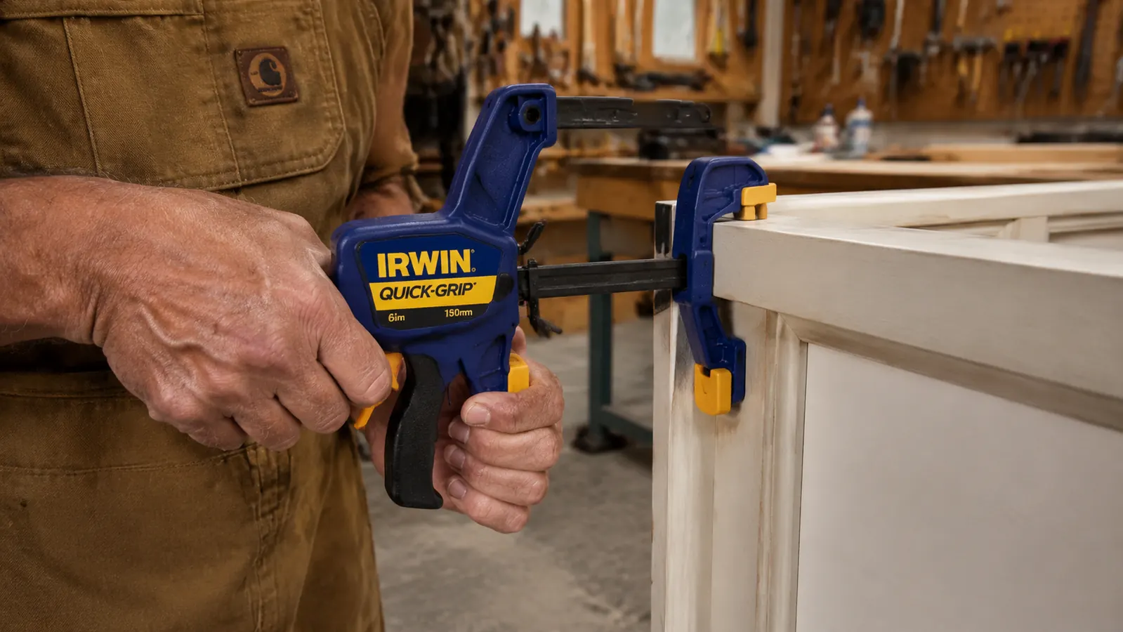One-handed application of an IRWIN Quick-Grip clamp on a cabinet face frame